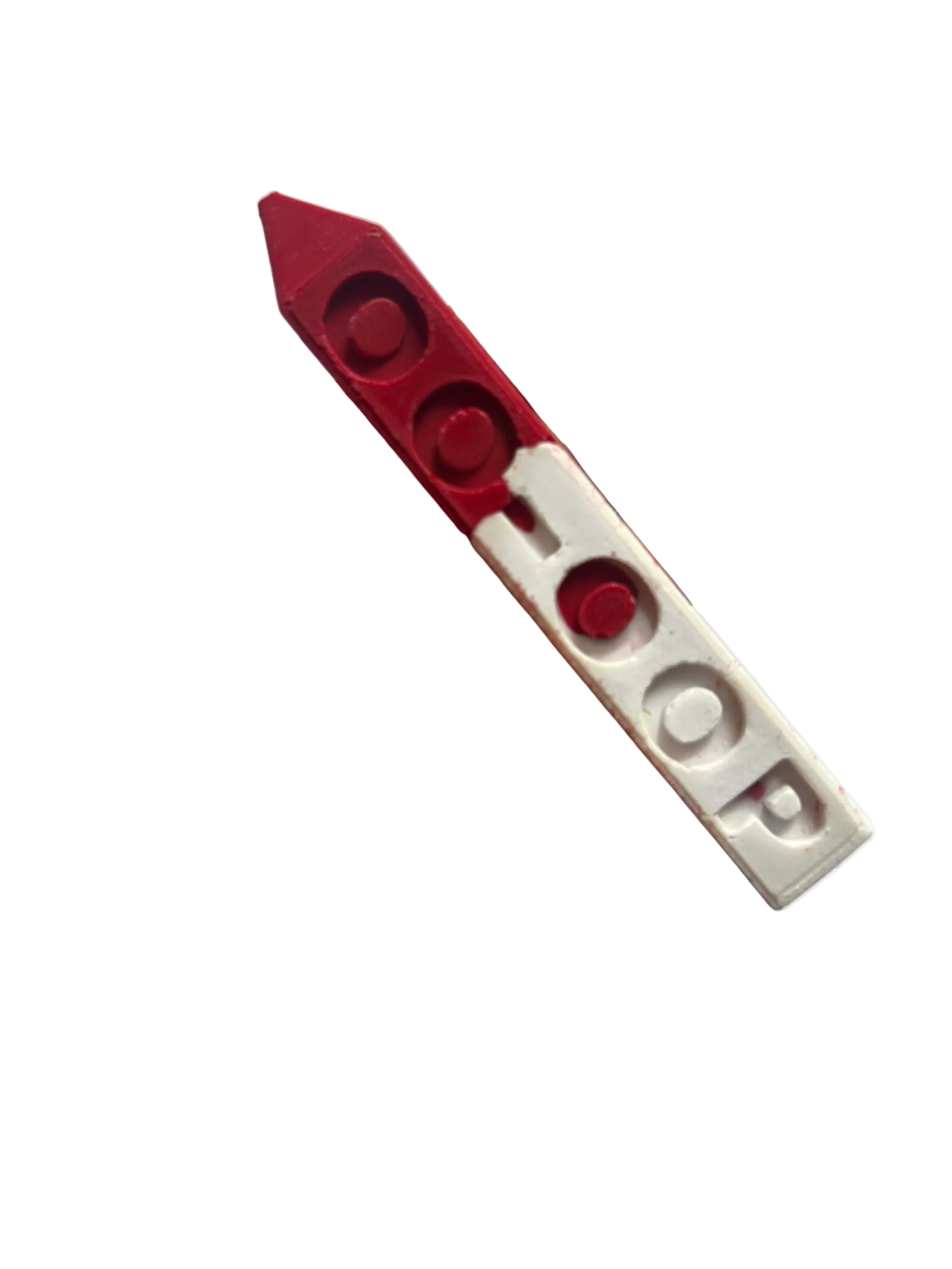 hand holding a red and white Delta crayon that says oo-oop 